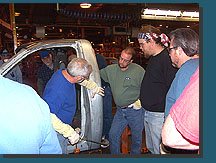 Instructor Rich Webb checking the repair of an upding